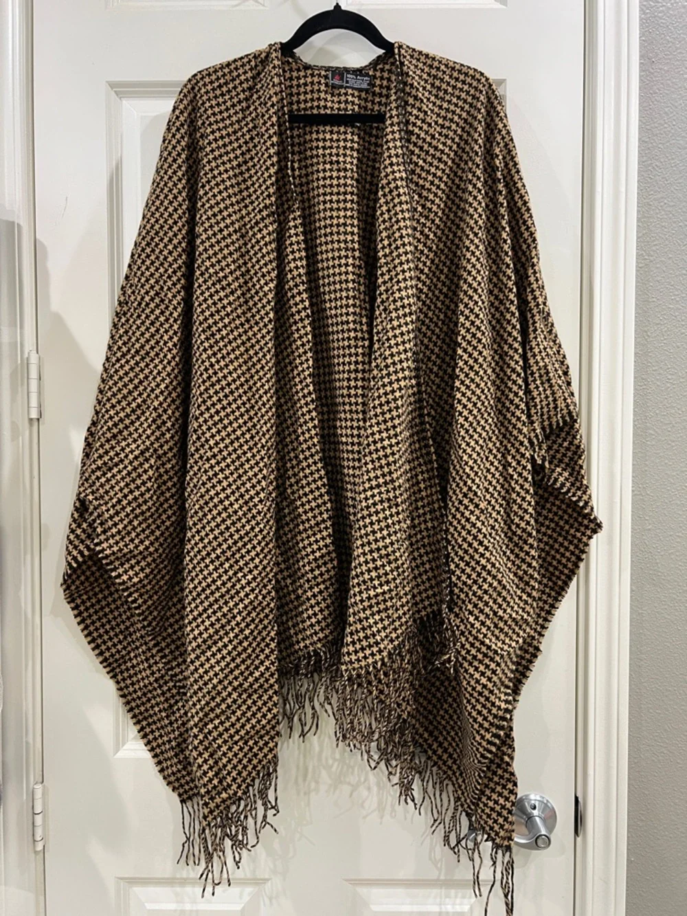 Brown and black houndstooth cape